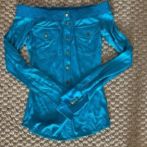 MARCIANO GUESS Teal shiny off shoulder top with pockets.